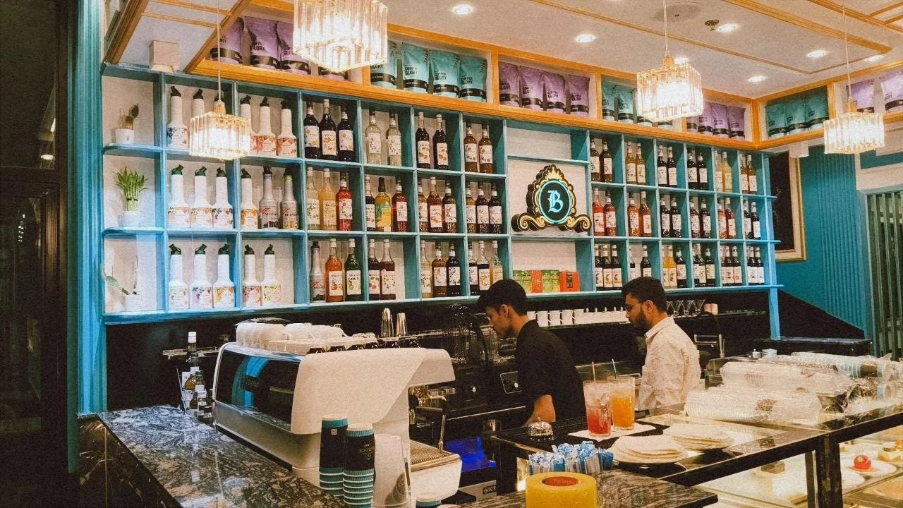 BAROCK CAFE teal bar shelves and espresso counter