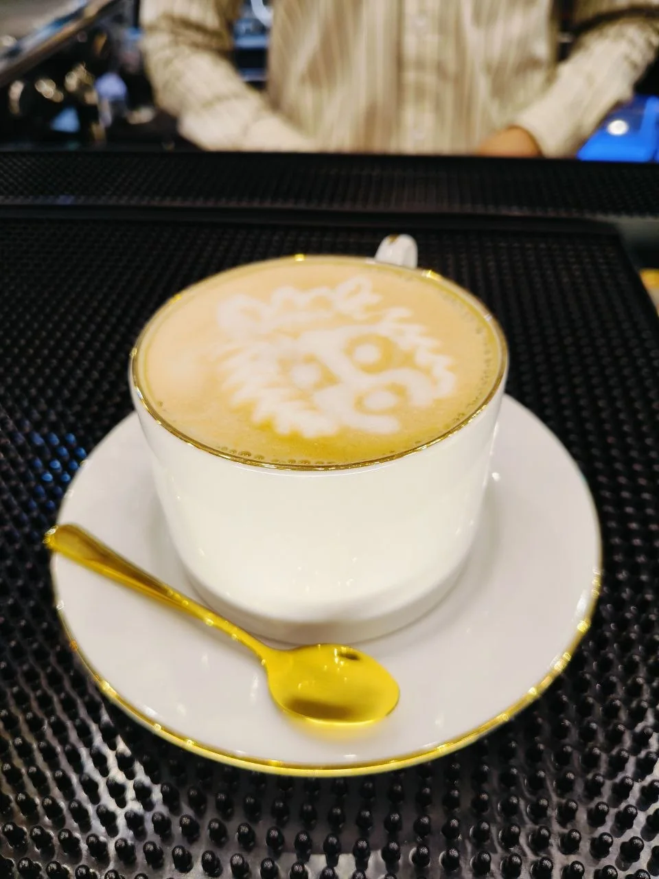 Cappuccino with latte art in BAROCK CAFE porcelain